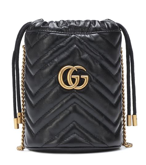 Gucci GG Emblem mini bucket bag